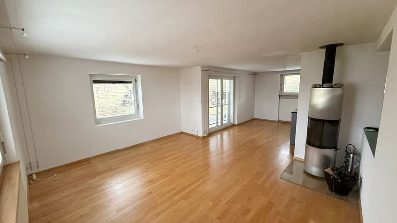 Hardwood floor, fireplace, sliding glass doors, two windows