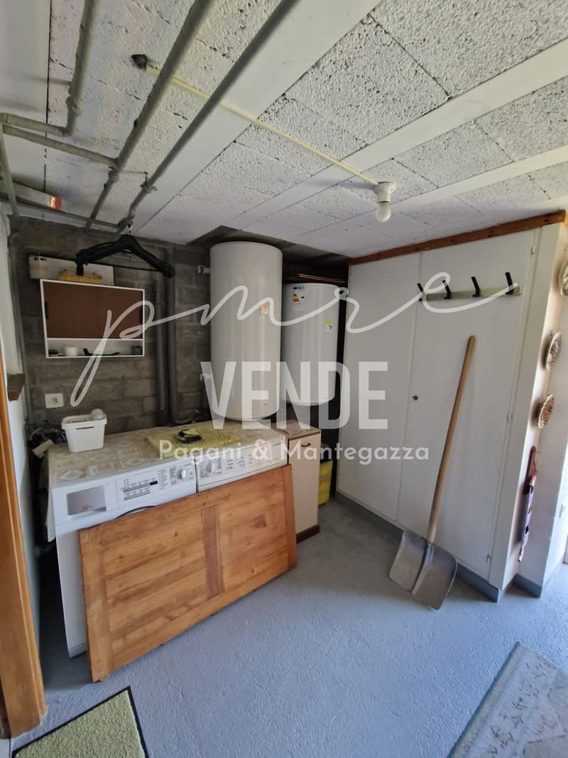 Appartement charmant de 5.0 pièces dans une maison rustique à deux familles avec grotte et jardin panoramique (21)