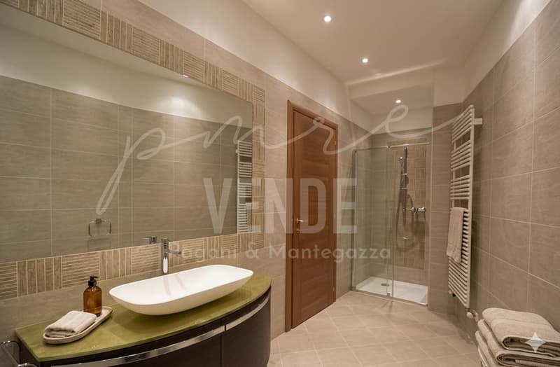 Grosszügige 4,5-Zimmer-Wohnung mit Privatgarten und Terrassen in Lugano-Cassarate (9)