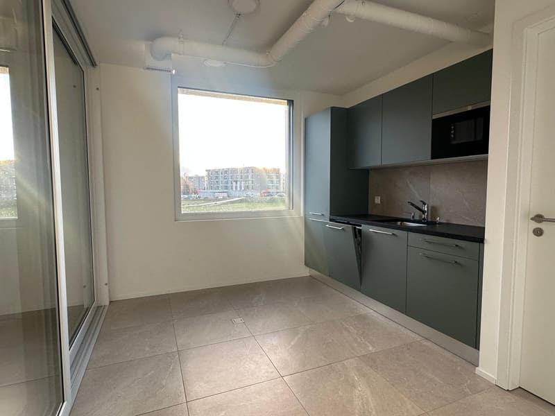 kitchen, white tiled floor, stainless steel sink, cabinets, microwave, faucet, large window