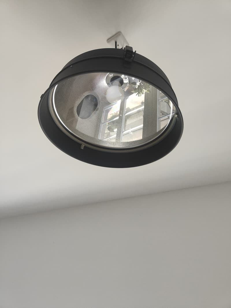 black ceiling lamp with a glass cover
