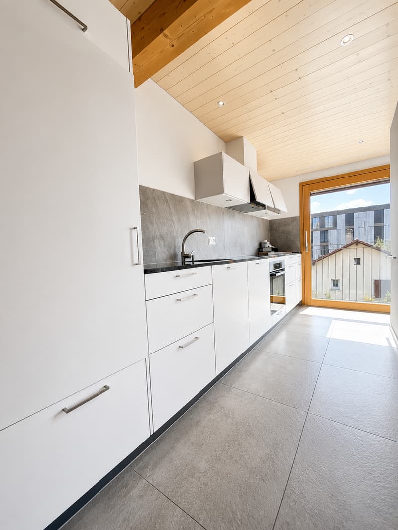 Charmant appartement de 2,5 pièces au dernier étage à Givisiez (1)