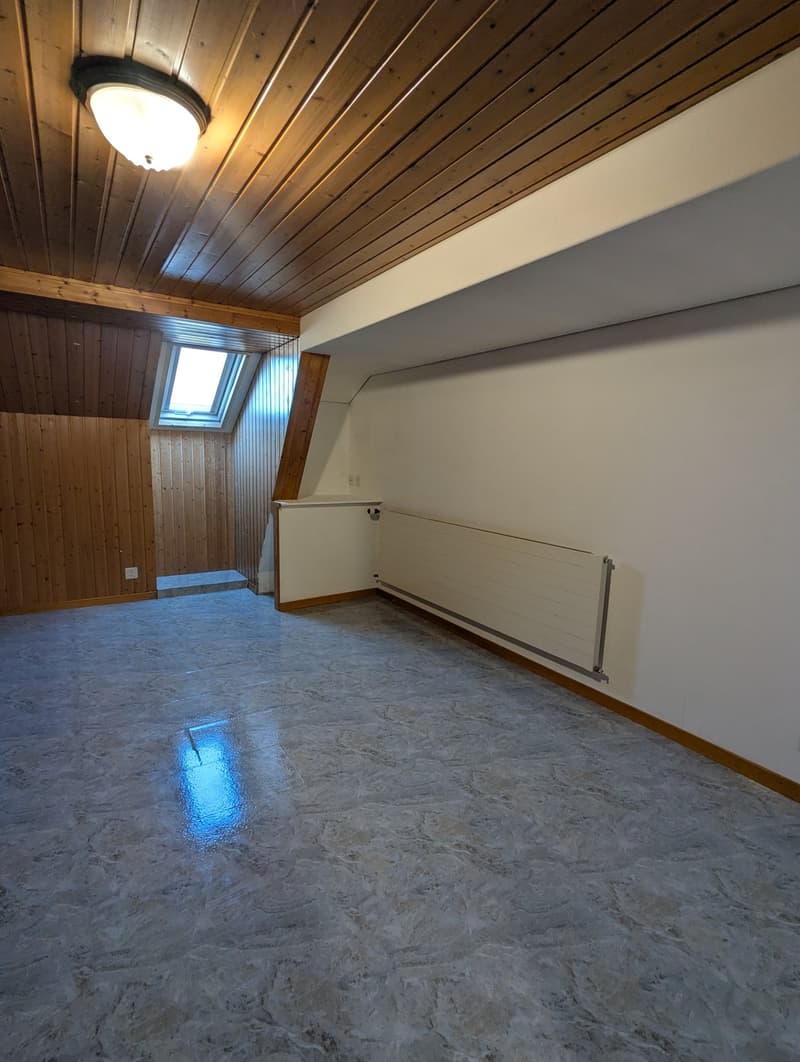 empty room, wooden ceiling, white walls, tiled floor, window, radiator