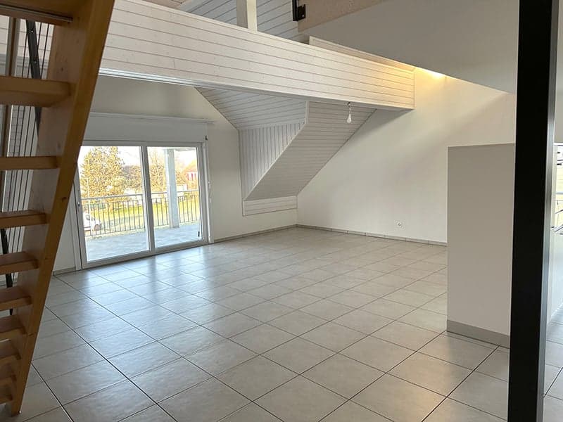 empty room, white tiled floor, wooden staircase, sliding glass door, balcony