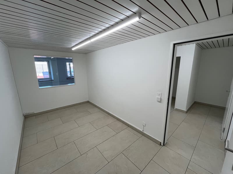 empty room, tiled floor, white walls, a window, ceiling light, power outlets