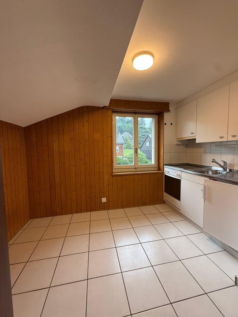 empty kitchen with white tiles, wooden walls, window, sink, oven, refrigerator