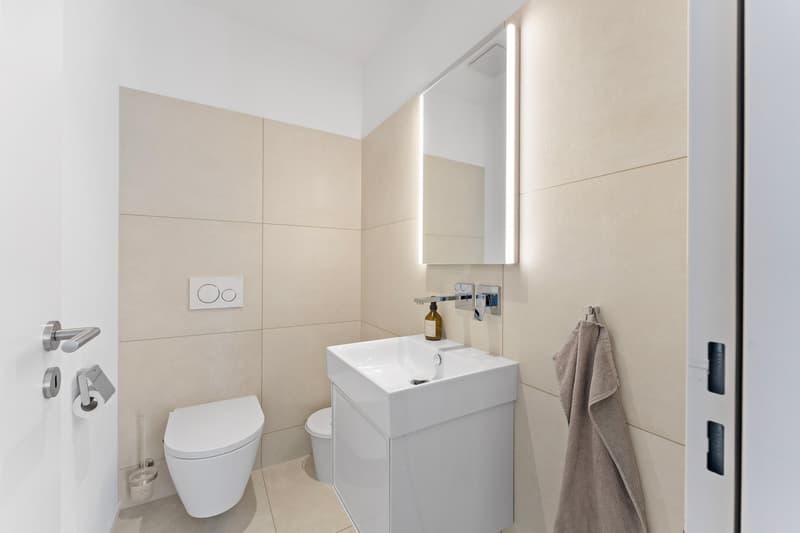 Exklusive 5.5-Zimmer-Traumwohnung mit Seeblick am Oberfeldweg in Bellmund (14)
