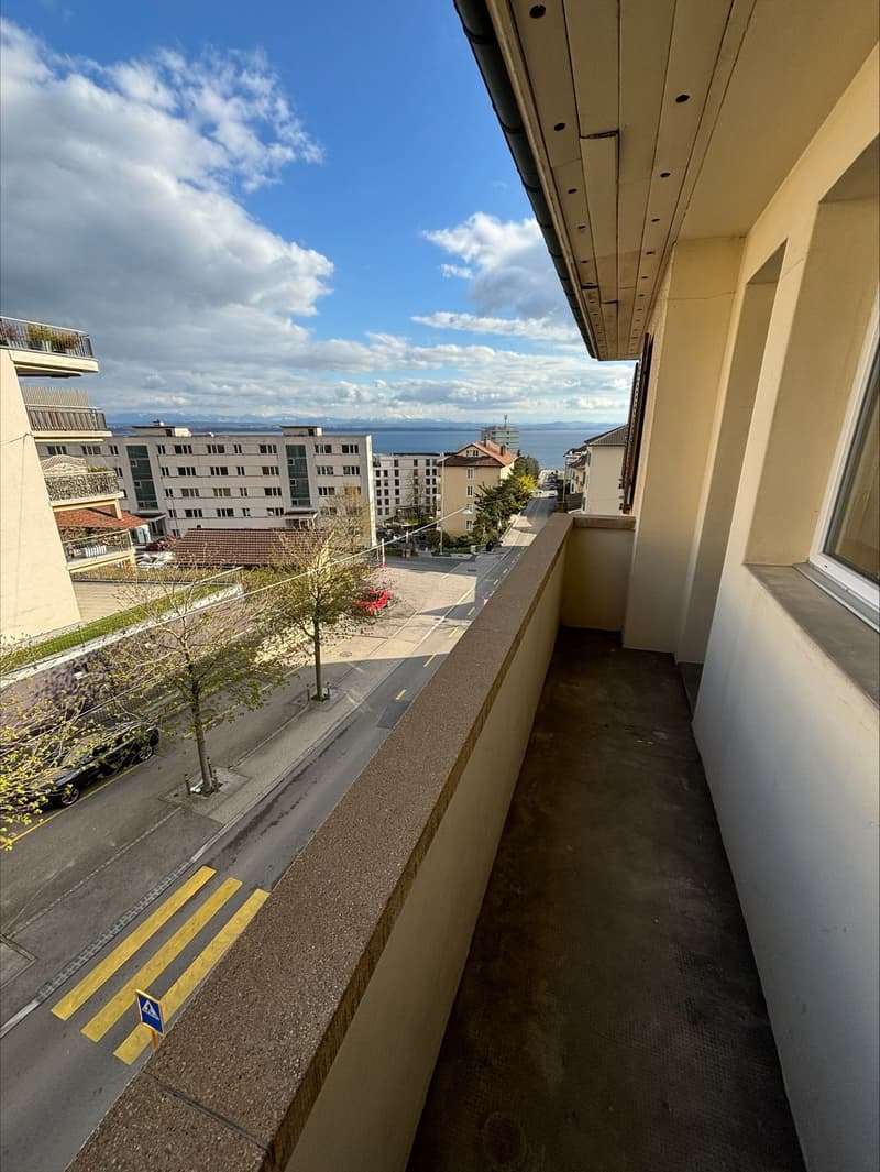 Balcony with view of the street and buildings