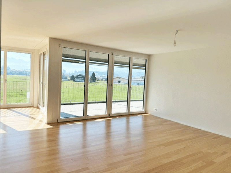 Wohnbereich mit direktem Ausgang zur Terrasse