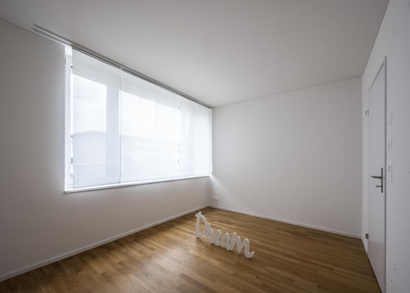 empty room, white walls, wooden floor, large window, white curtains