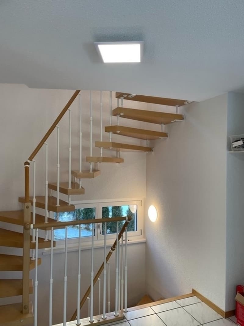 wooden staircase, white handrail, white steps, white ceiling light, white wall, window