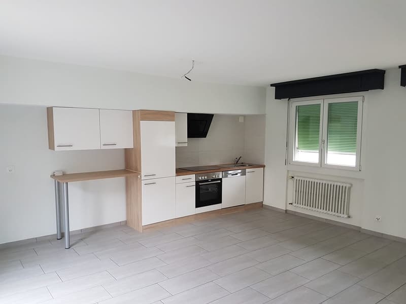 modern kitchen with white cabinets, tiled floor, sink, oven, dishwasher, window with blinds
