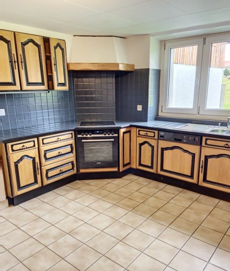 kitchen with wooden cabinets, tiled floor, black tiled backsplash, oven, dishwasher, sink, window