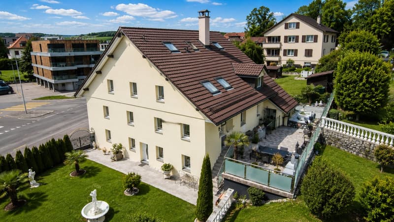 Eigenschaft mit Charakter, bestehend aus 3 Wohnungen – 393 m² Wohnfläche in Romont (1)