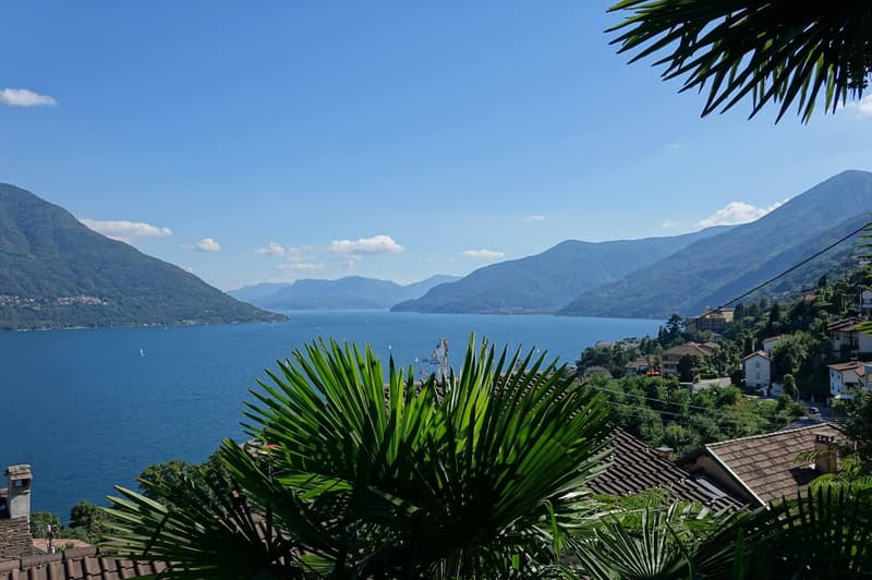 view from the hill overlooking Lake Como with mountains in the background