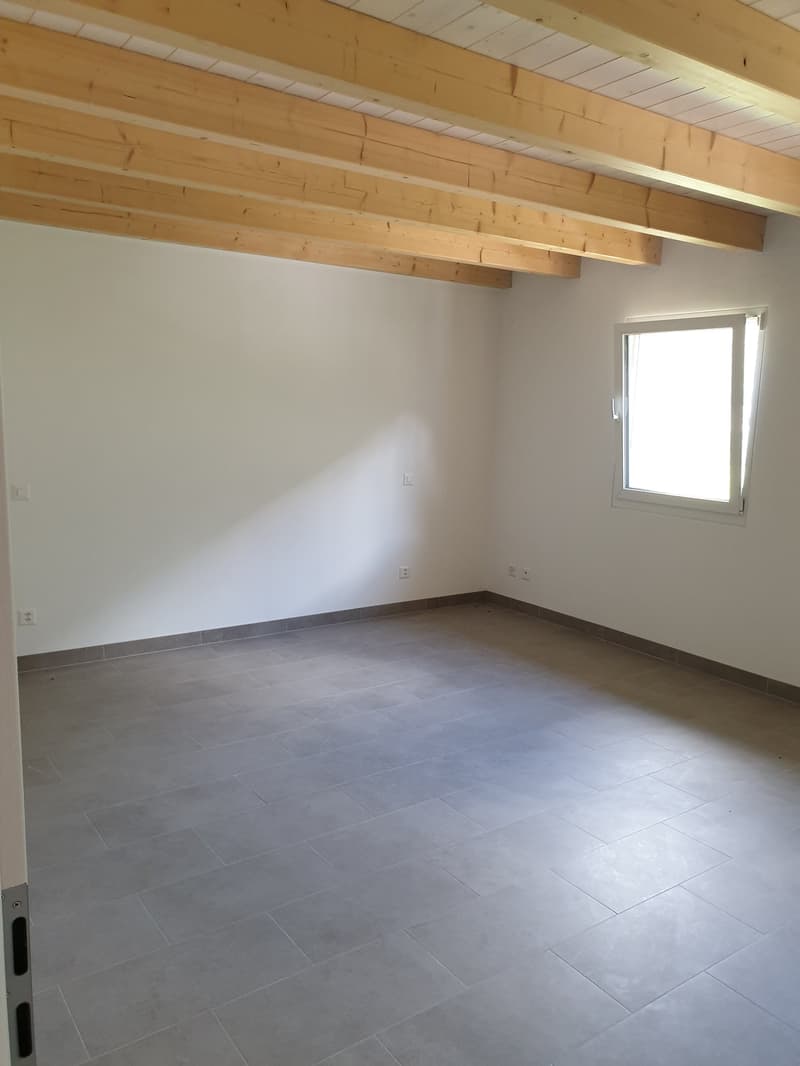 empty room, tiled floor, wooden ceiling, white walls, window