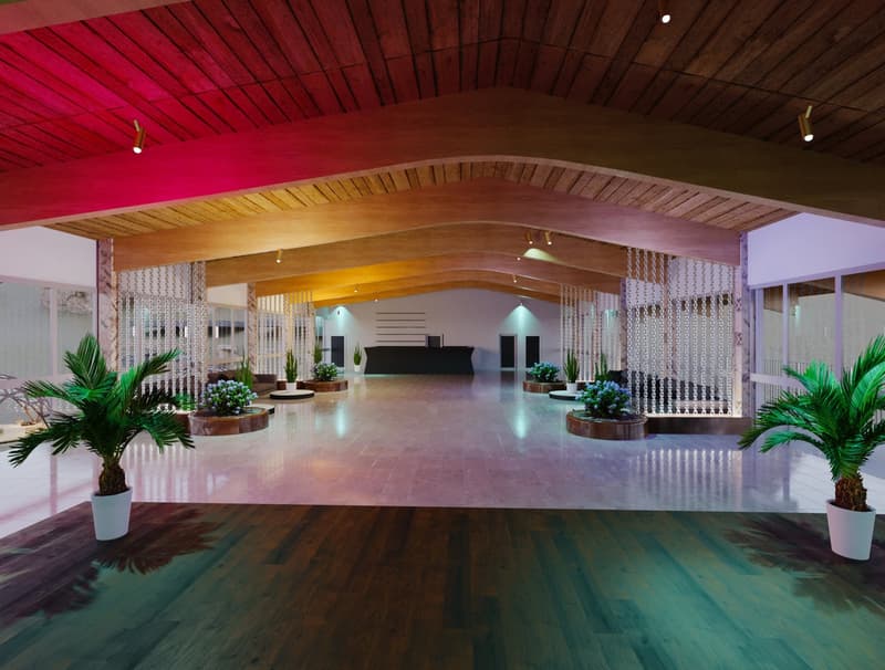 Large open lobby area with high wooden ceiling, red and yellow lighting, wooden beams, potted plants, and a tiled floor with a reflection.