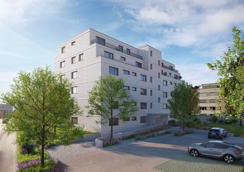 4 story apartment building, white exterior, multiple balconies, parking area, trees, shrubs
