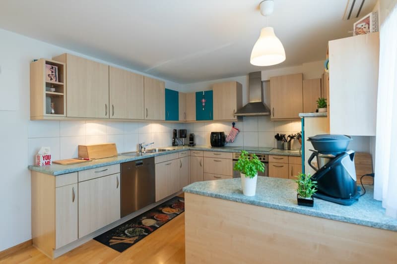 Espace de vie - maison mitoyenne bien entretenue dans un emplacement attractif. (7)