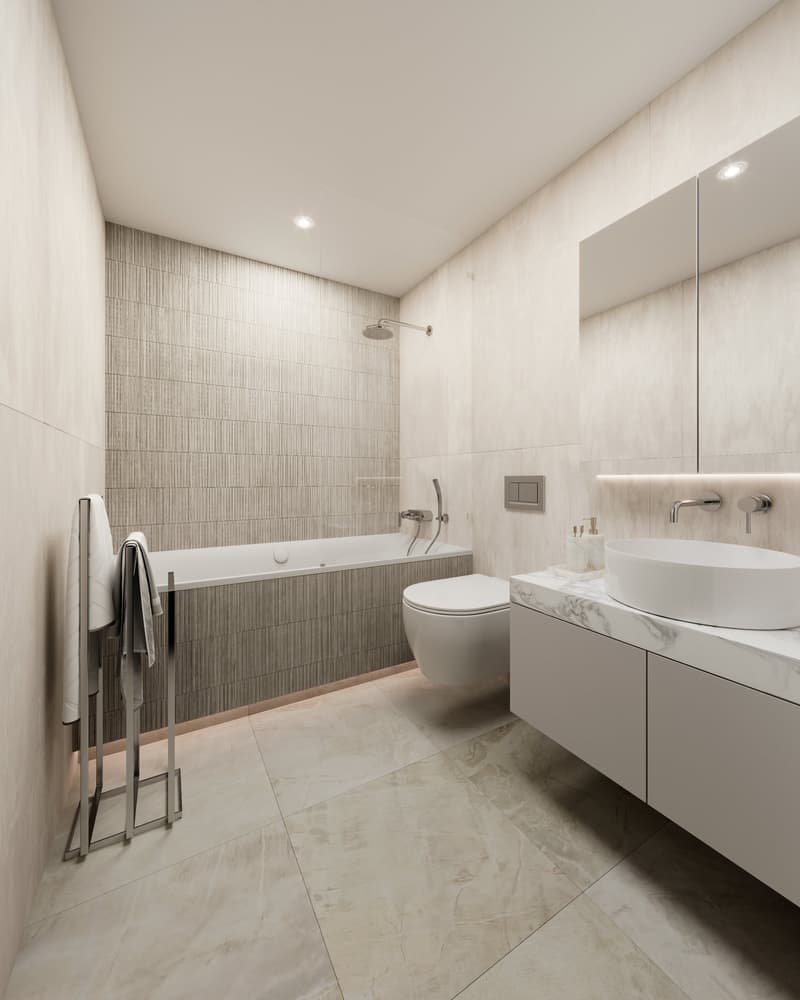 modern bathroom with bathtub, toilet, sink, mirror, towel rack, and tiled floor