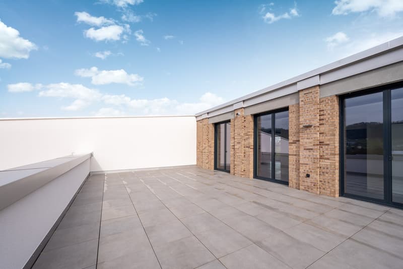 tiled floor, brick walls, sliding glass doors, metal railings, view