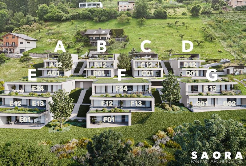 Aerial view of a residential complex with multiple buildings, each labeled with letters and numbers, raised ground floor, balconies, and green spaces