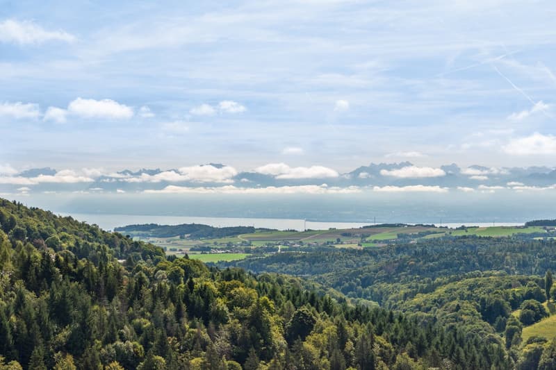 overlooking valley, hills, sea, and mountains