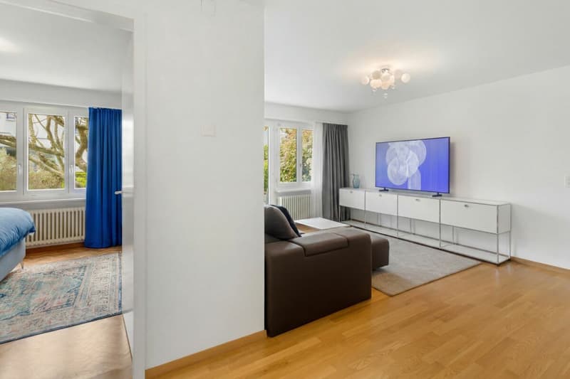 Charmant appartement de jardin 3 pièces avec espace de séjour ensoleillé et vue ouverte sur le vert (9)