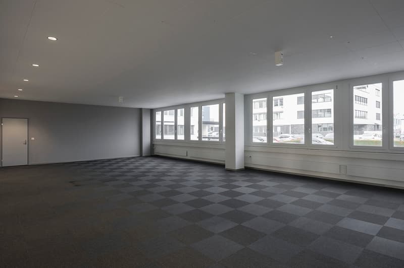 empty room, tiled floor, large windows, bright