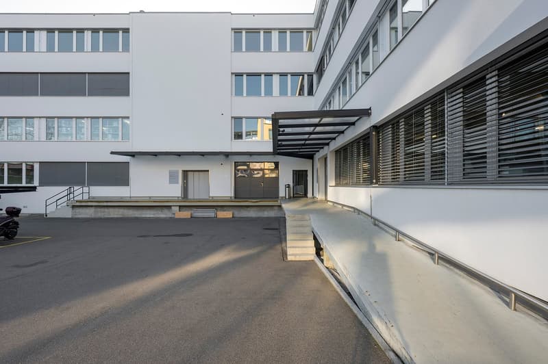 white building, garage, windows, parking lot, ramp