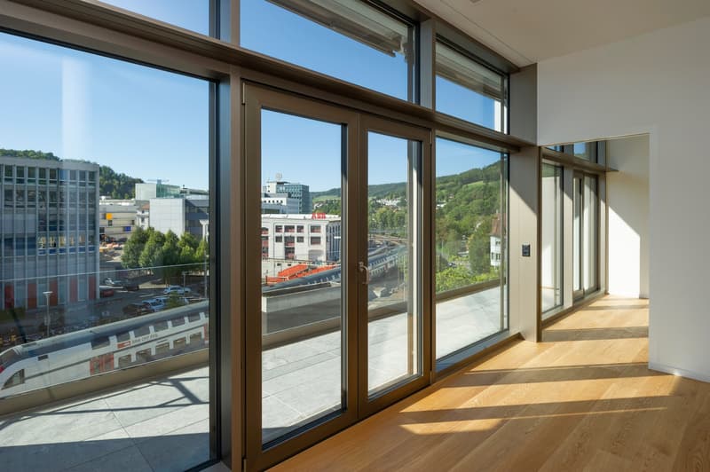 sliding glass doors with balcony, view of city, raised ground floor, wooden floor