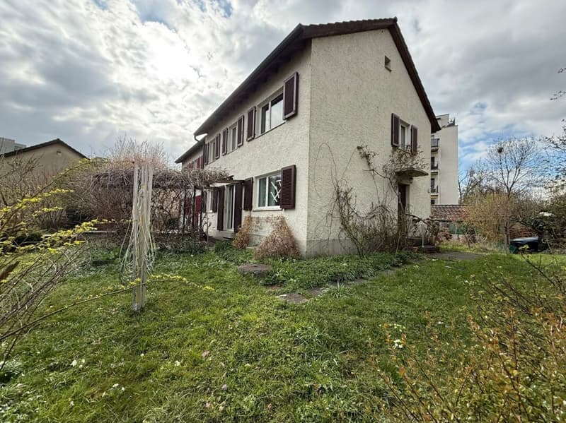 Casa a due famiglie con giardino (2)