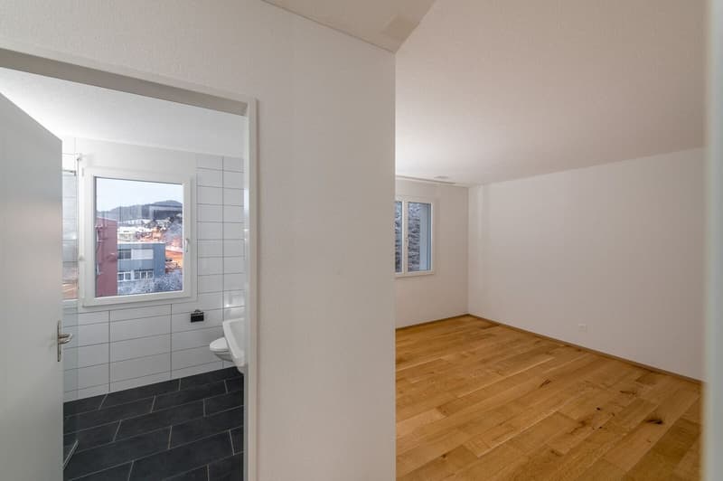 Grande appartamento mansardato quasi nuovo di 4,5 locali 131 m2 (11)