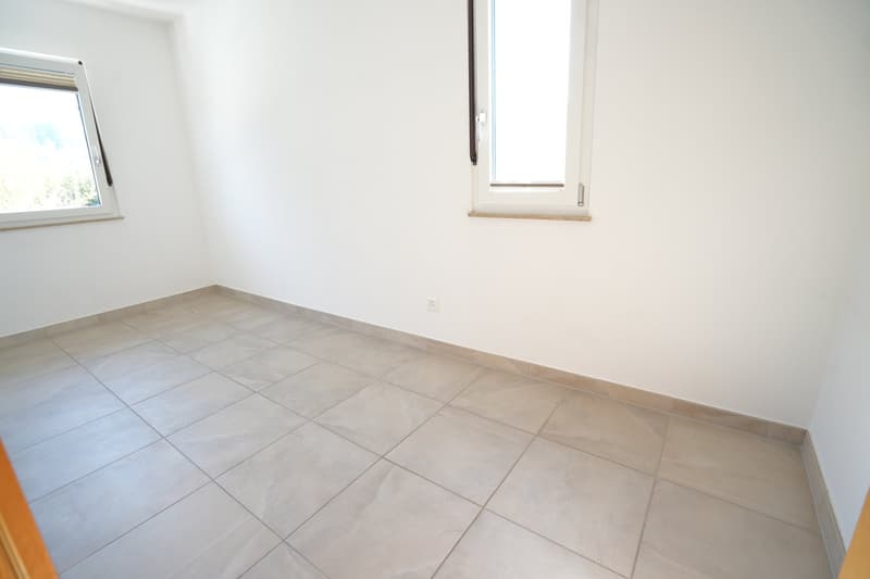 Sonniges 4-Zimmer-Doppeleinfamilienhaus mit Terrasse und Gartenhof in ruhiger Lage (10)
