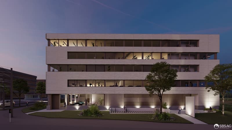 Modern building with multiple floors, large windows, balconies, and a tree in front