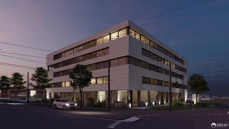 Modern office building with glass facade, multiple floors, illuminated windows, landscaped entrance, car parked in front.