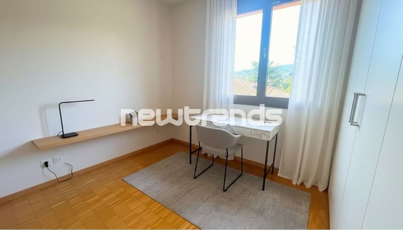 SPACIOUS 2.5-ROOM APARTMENT WITH TERRACE AND PARTIAL LAKE VIEW AND PARKING SPACE (8)