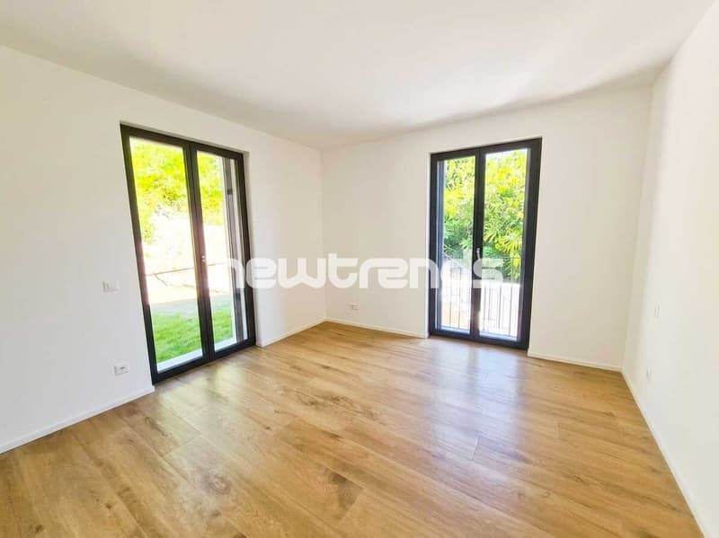 Pura-Caslano: new 2.5-room apartment with garden and patio for rent (2)