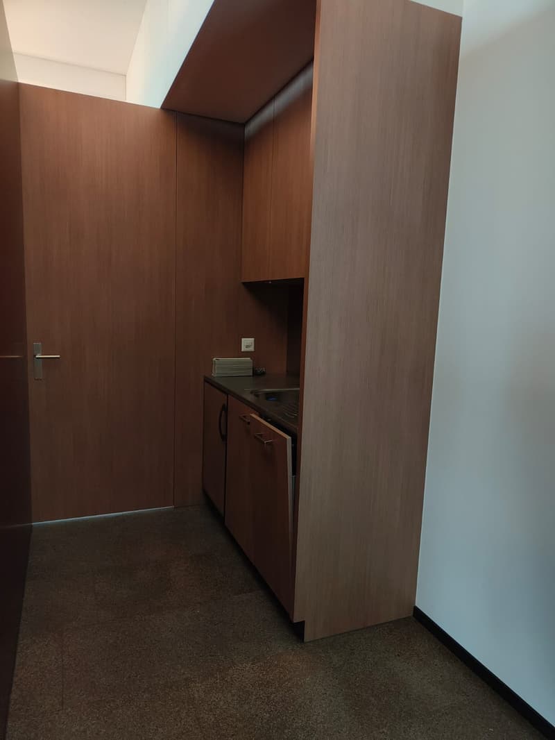 modern kitchen area, cabinets, countertop, sink, dishwasher