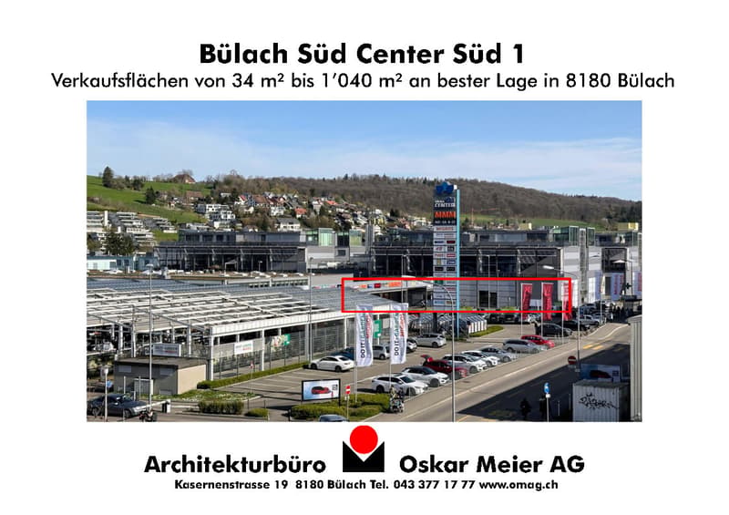 Commercial building with many retail stores and a parking lot in front of it