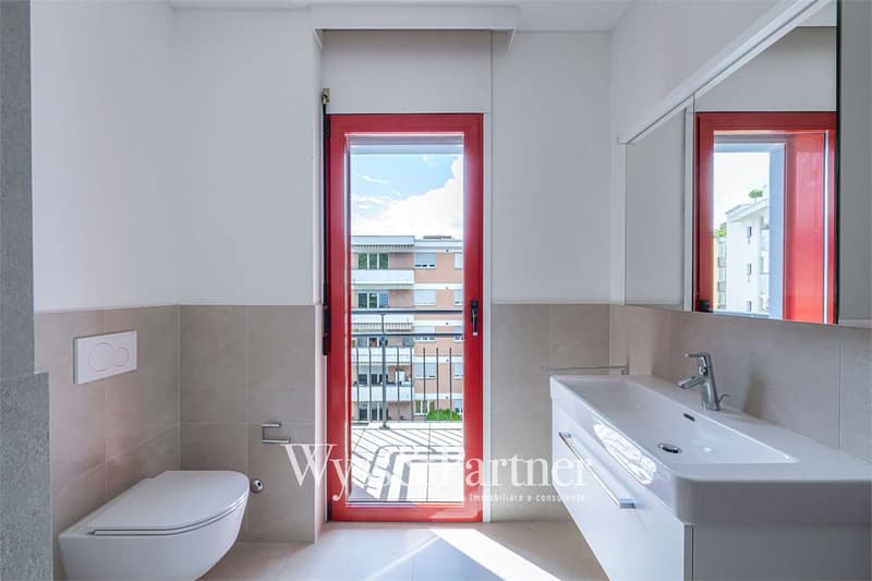 4.5 locali ristrutturato a Lugano con terrazza, 2 bagni e parcheggio (8)