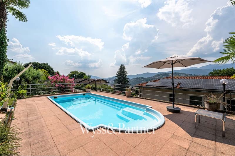3,5 locali con giardino privato, terrazza e piscina a Pregassona (11)