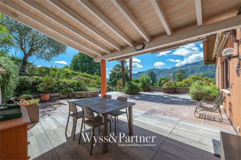 Casa su 3 livelli con terrazza e giardino a Vezia (13)