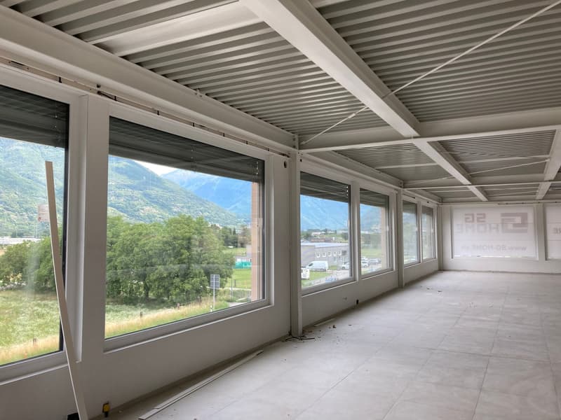 large windows, white walls, white ceiling, tiled floor, view of mountains and trees