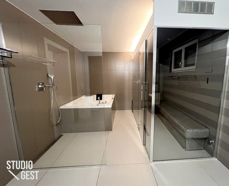 Elegante attico con grandissima terrazza coperta (20)