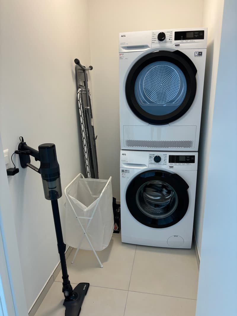 AEG washing machine and dryer, laundry basket, vacuum cleaner