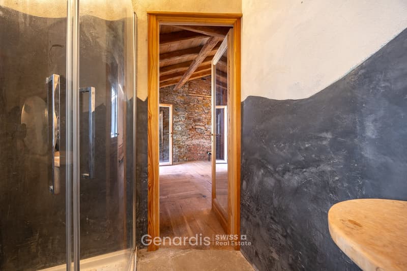wooden door, wooden floor, stone wall, glass door, wooden table