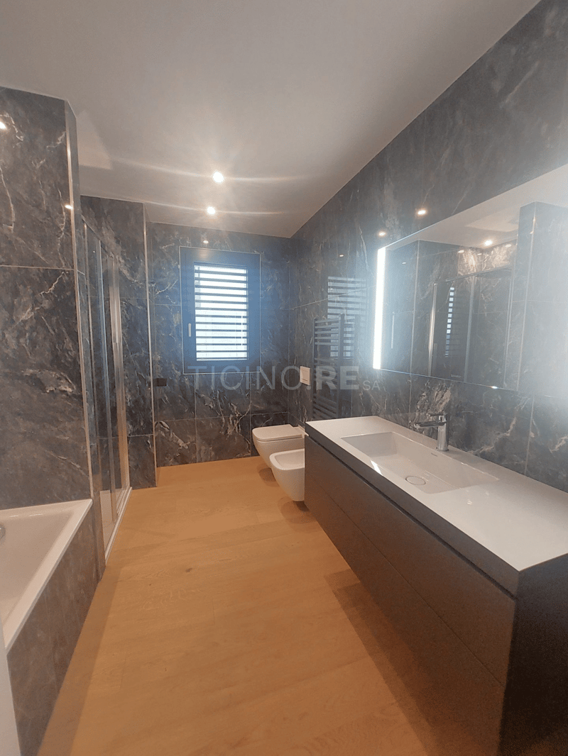 Montagnola: Lussuoso Appartamento con Vista Panoramica e Giardino Privato (8)