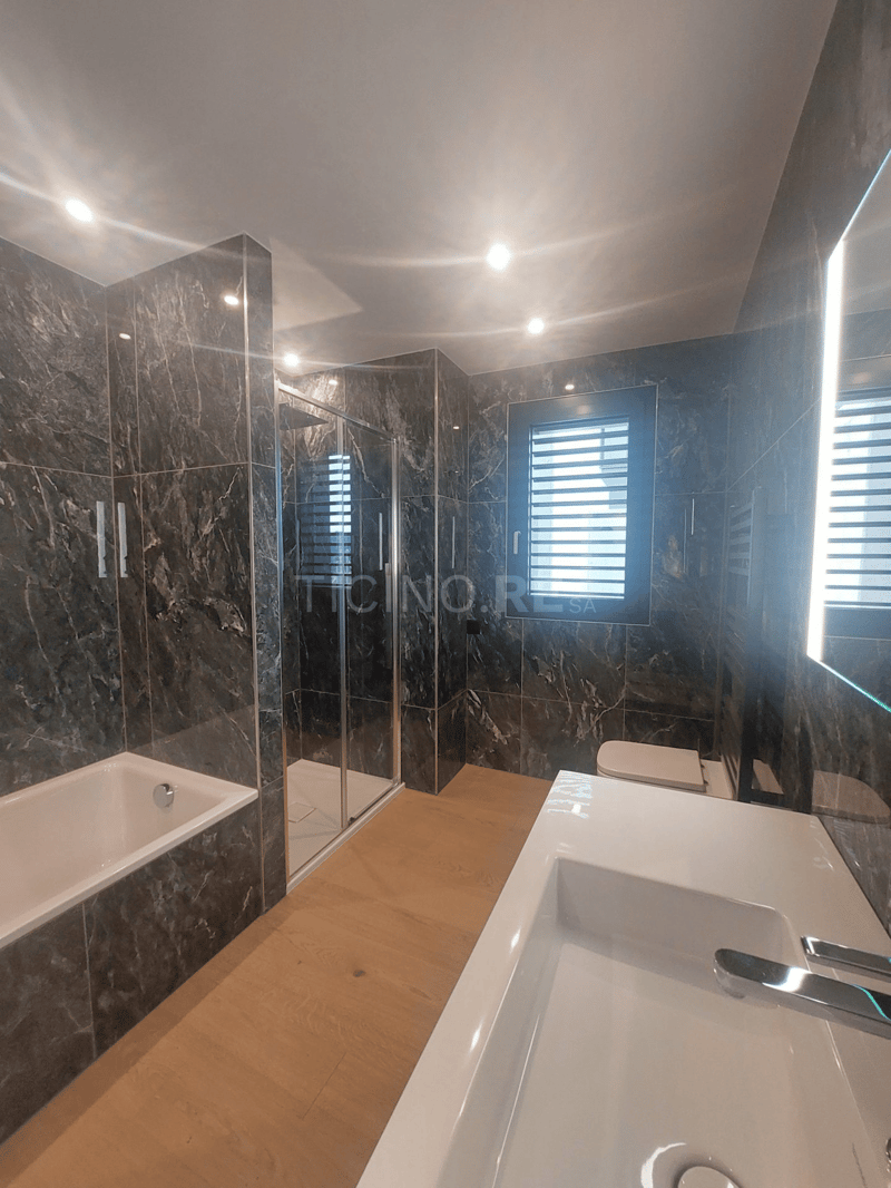 Montagnola: Lussuoso Appartamento con Vista Panoramica e Giardino Privato (9)