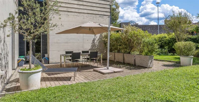 elegante appartamento 3,5 locali con ampio giardino (1)